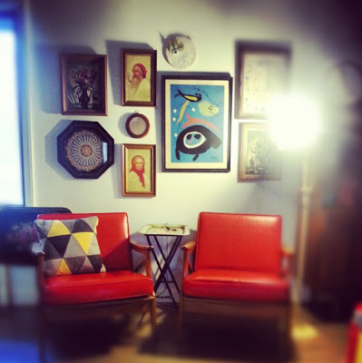 gallery wall with vintage art